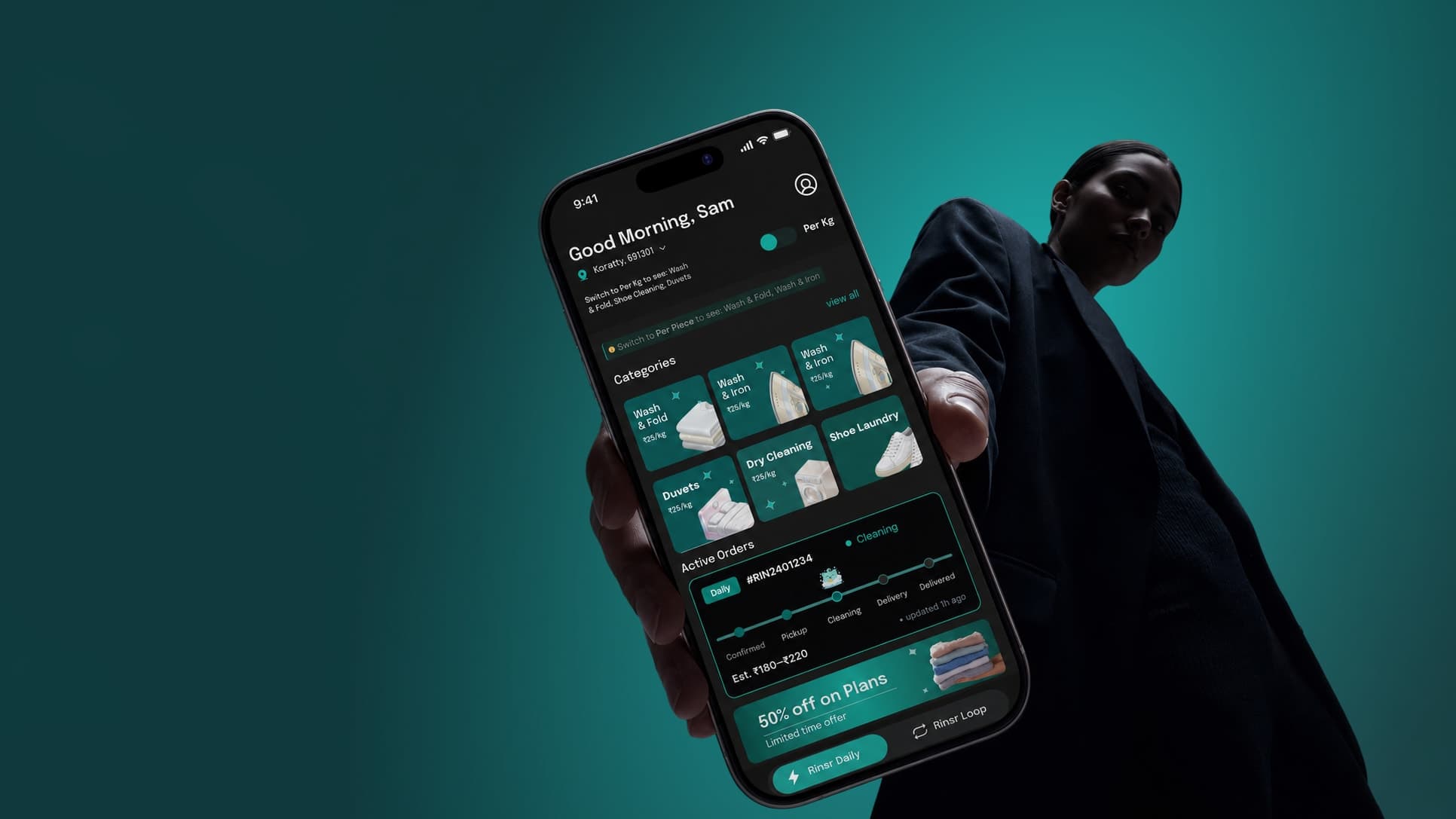 A person holding out a phone showing the RINSR home screen, with an active order and its estimated price of ₹180–₹220